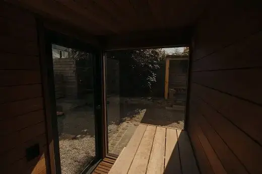 Modern outdoor sauna Kirami FinVision® -sauna S Misty with black thermal spruce cladding