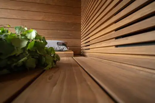 Infrared heaters hidden behind custom paneling – Kirami FinVision® -sauna M Misty | Outdoor sauna